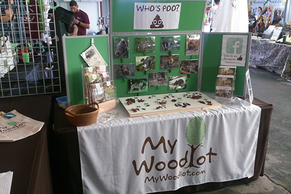 MyWoodlot booth with the Whose Poo? game set up at the New York State Woodsmen’s Field Days in Boonville, New York.