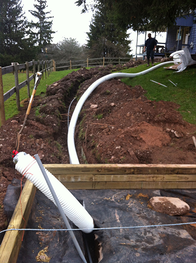 Insulated pipe inside corrugated tubing. 