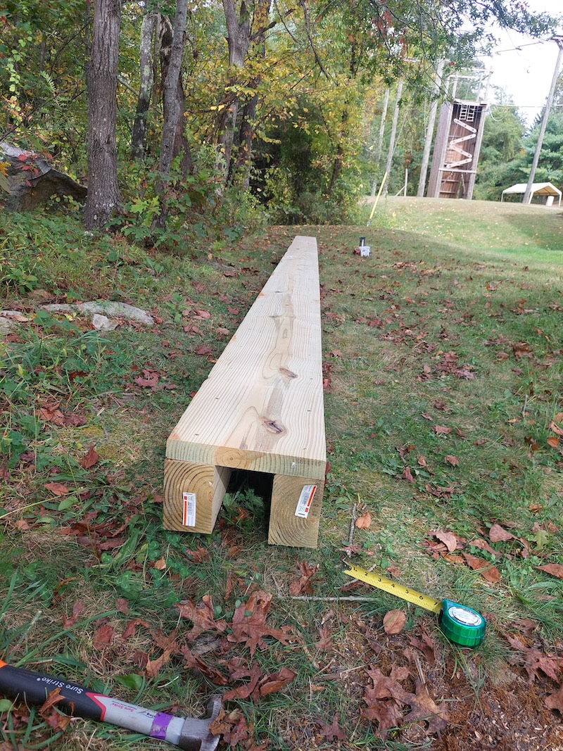 Culvert bottom and sides. Culvert side boards attached to the bottom board, creating a long, narrow three-sided box.