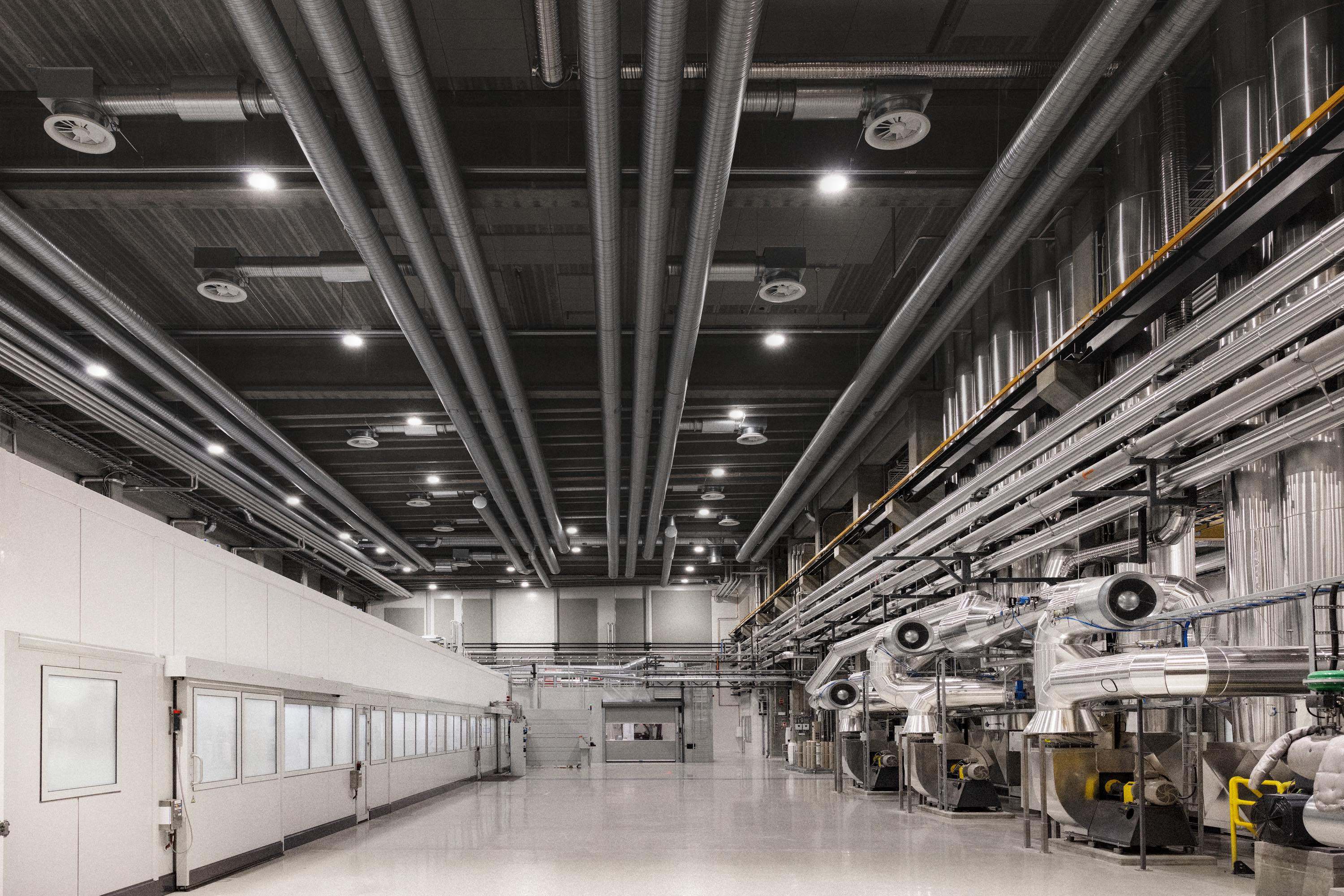 The very clean interior of the Spinnova fiber factory showing some of the machinery that makes fiber from wood chips. 